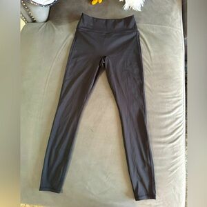 Black FABLETICS leggings . Worn once . Small pocket on back . Leopard print .